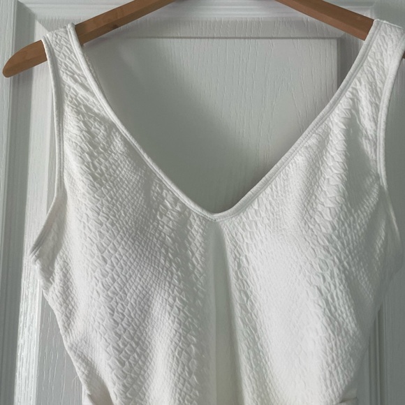 White bathing suit. Just bought new in April. - Picture 6 of 7